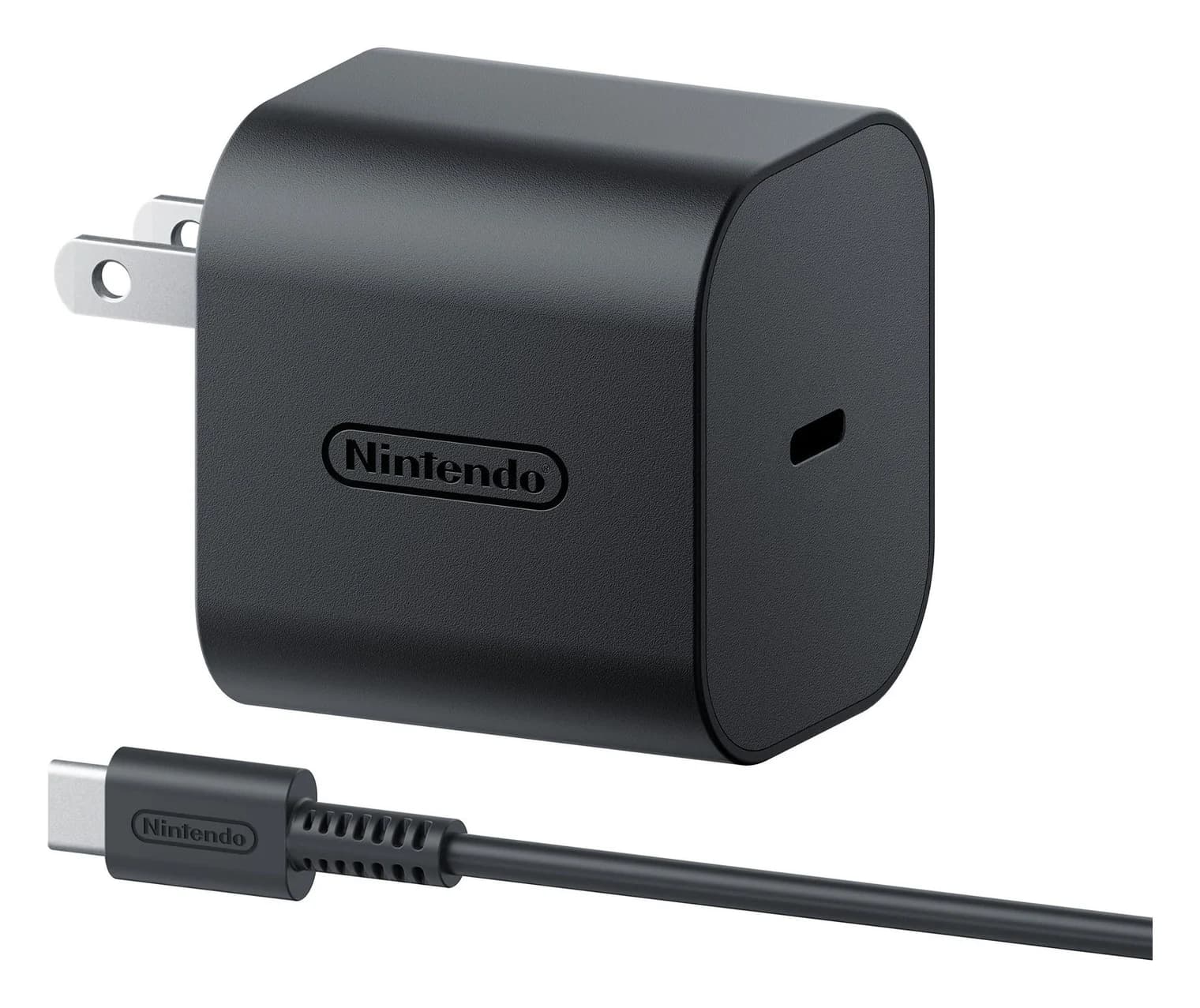 Nintendo Switch 2 AC Adapter in black with its detachable USB-C cable, three-quarter view showing the USB-C port and US prongs